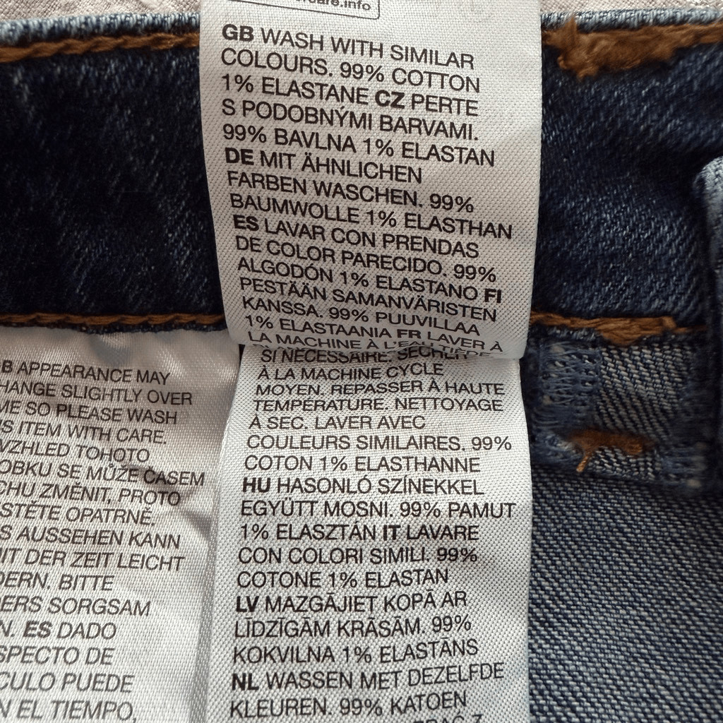 & Other Stories High Rise Flared Jeans with Patch Pockets in Mid Blue Wash 28