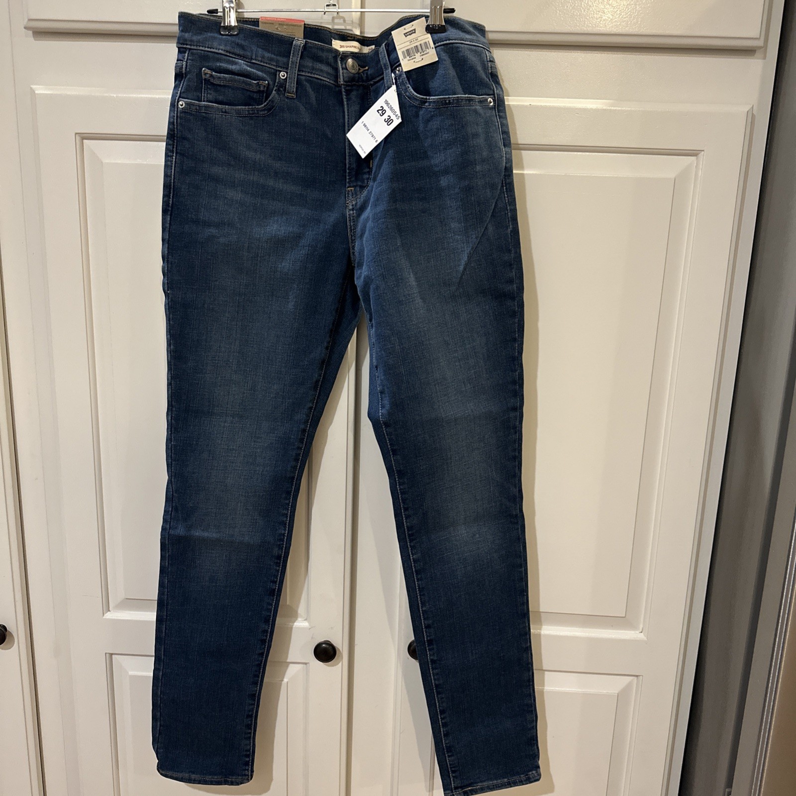 Levi’s Women’s 311 Mid-Rise Smoothing Tummy Panel Shaping Skinny Jean