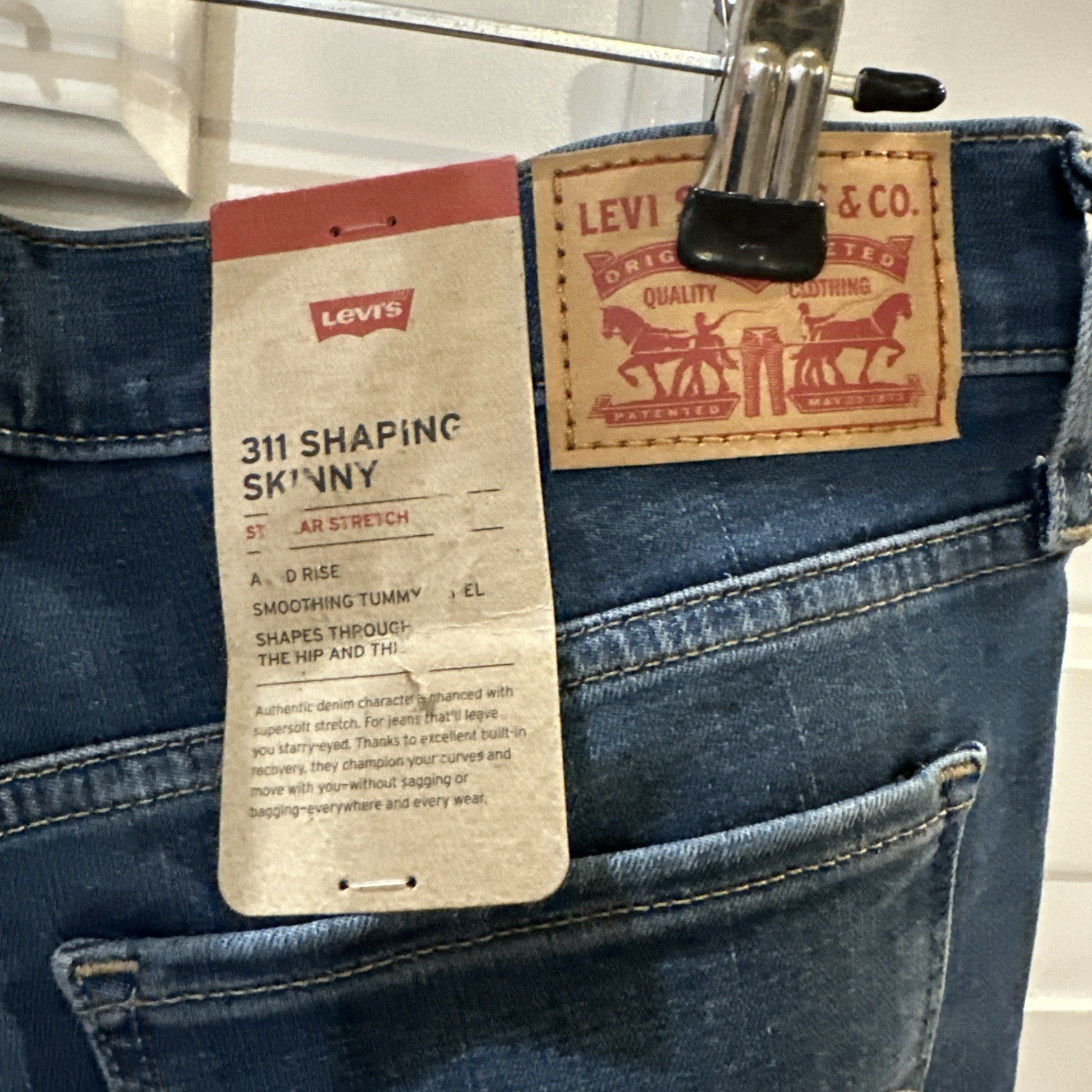 Levi’s Women’s 311 Mid-Rise Smoothing Tummy Panel Shaping Skinny Jean