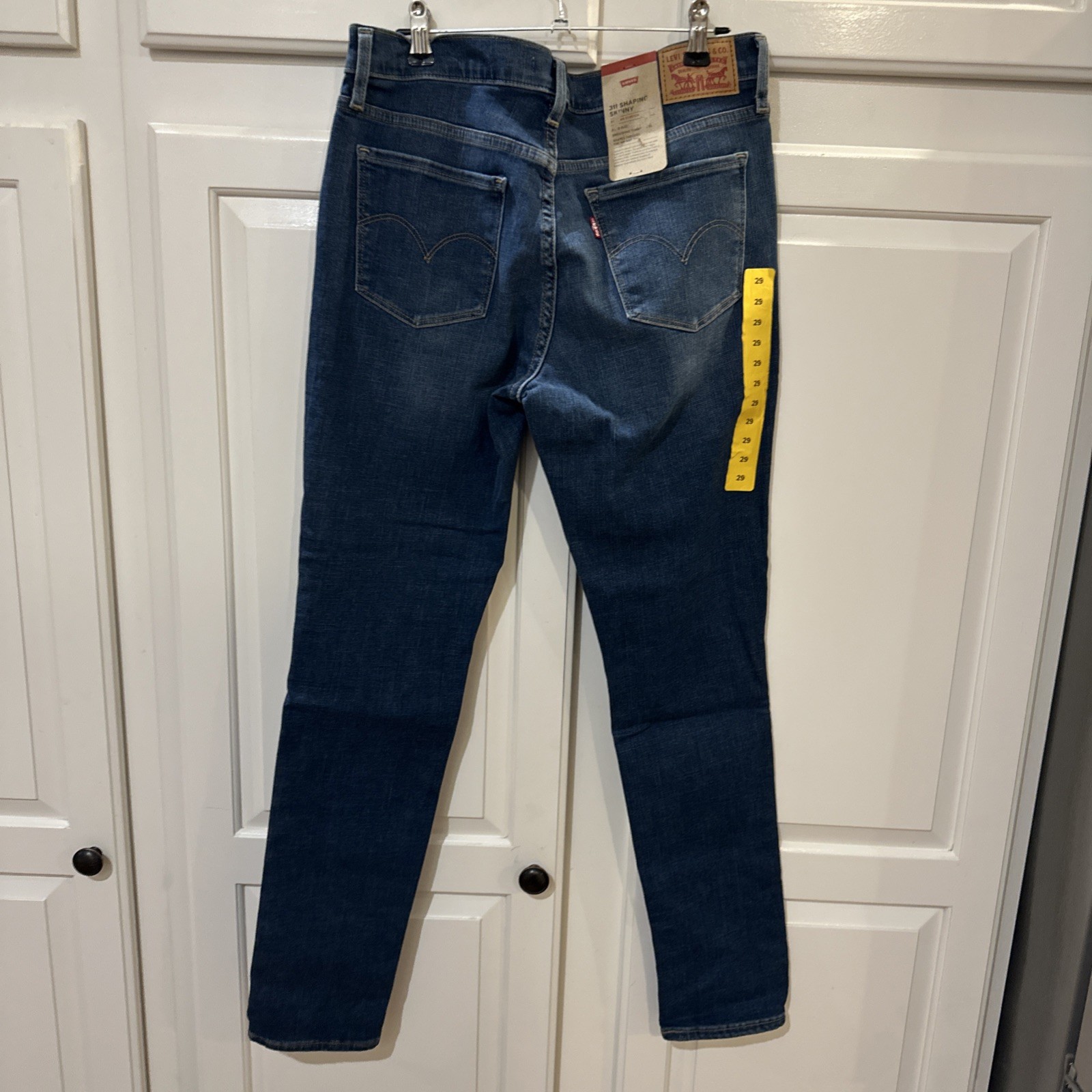 Levi’s Women’s 311 Mid-Rise Smoothing Tummy Panel Shaping Skinny Jean