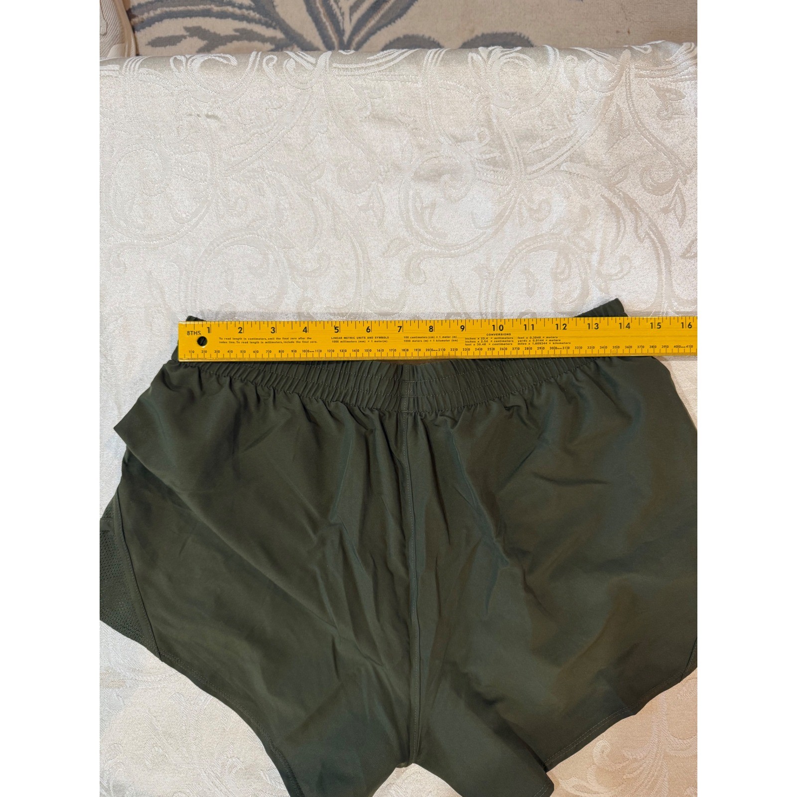 Under Armour Womens Fly-By 2.0 Running Shorts Olive Green Size Medium Zip Pocket