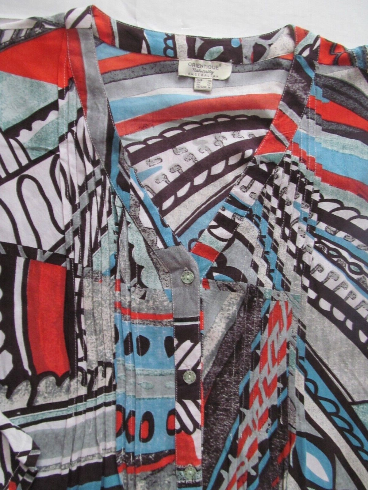 Orientique Australia geometric tunic top Front pleats Pockets sz med