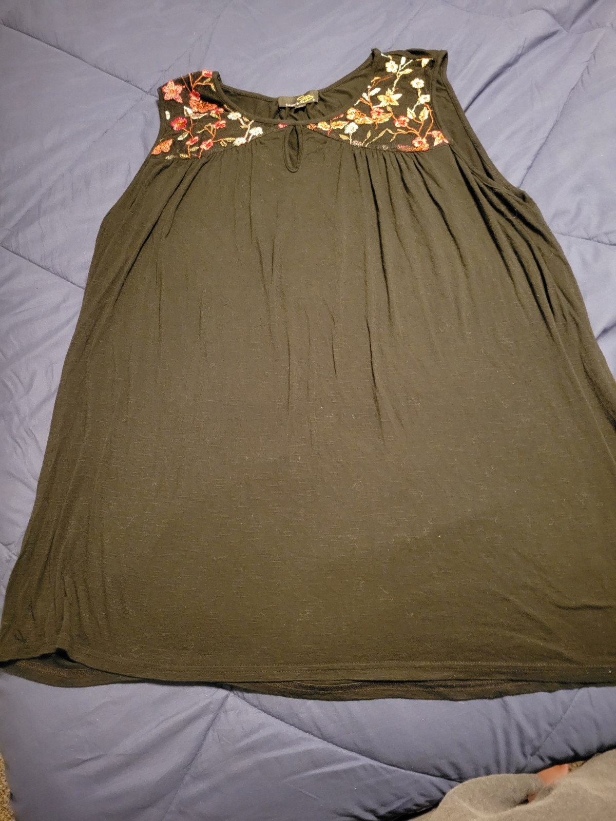 Black Tunic Length Sleeveless Tee With Floral Embroidery And Keyhole